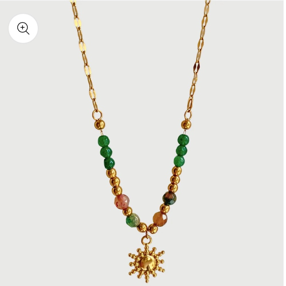 Brand new beaded necklace with sun pendant
